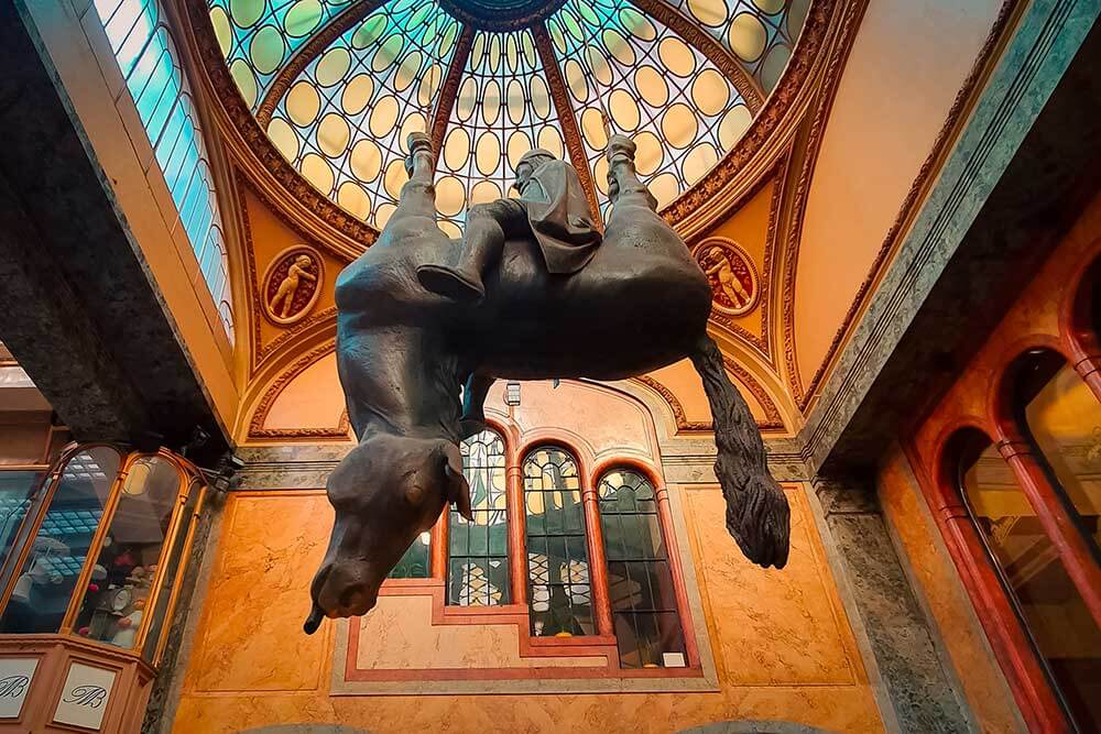 Photo of a Statue of King Wenceslas from the ceiling of the Art Nouveau Lucerna Palace - Example of Surreal Art in Prague