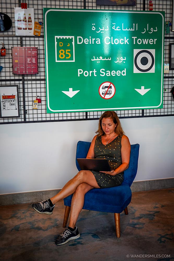 Working on laptop in the contemporary-style lobby of Rove City Centre Dubai