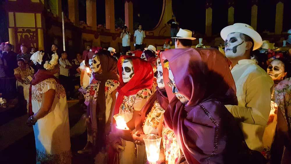 Hanal Pixan - Janal Pixán Procession with people wearing skull masks