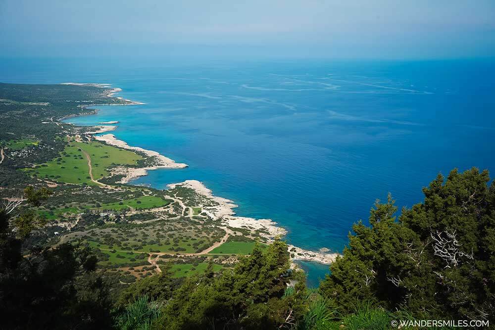 Photo of Akamas trail near Paphos with turquoise blue water and lush green coast - Best things to do in Paphos