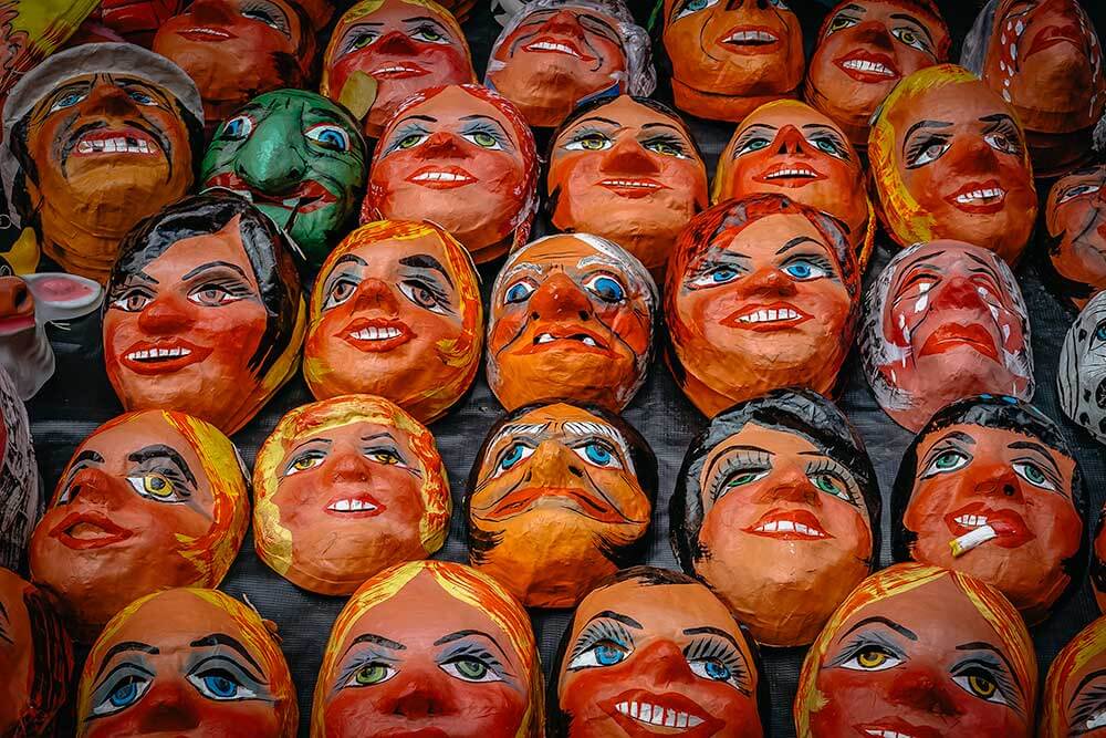 Effegies burned on New Year's Eve or A&ntilde;o Viejo celebrations. Paper mache faces painted red and orange.