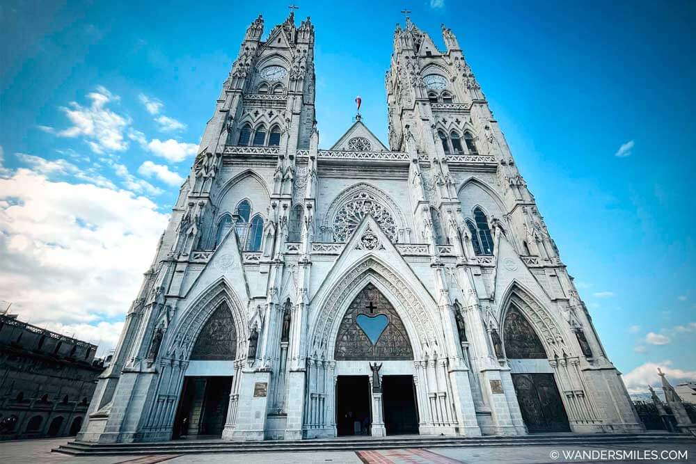 White Basilica de Quito with blue skies