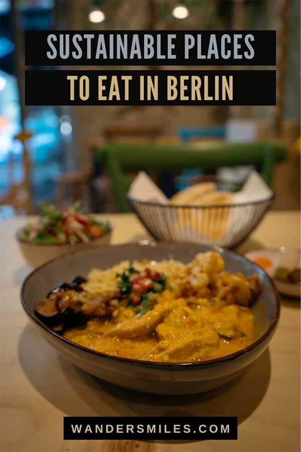 Photo of chicken curry in a Middle East social cafe, RefuEats. Text overlaid SUSTAINABLE PLACES TO EAT IN BERLIN