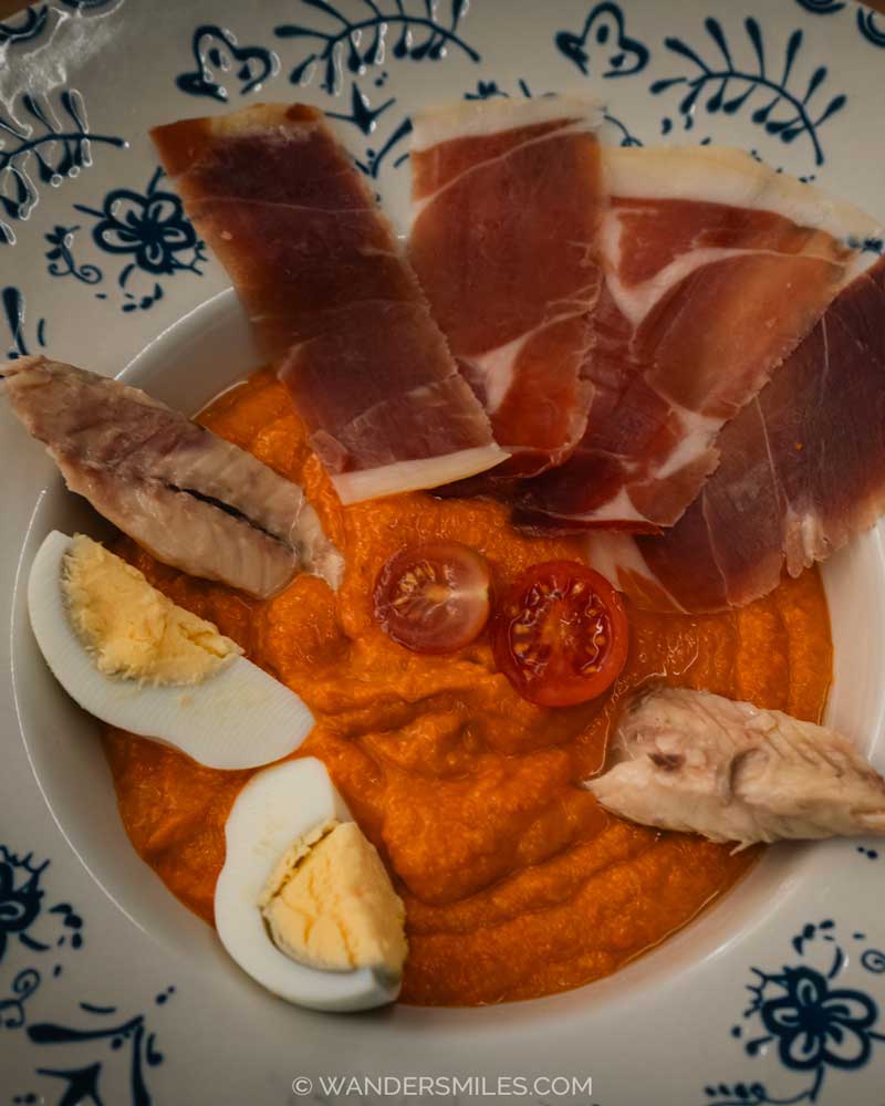 Porro &ndash; typical tapas from Antequera &ndash; a thick cold tomato soup with pieces of ham, egg and anchovies on the bowl
