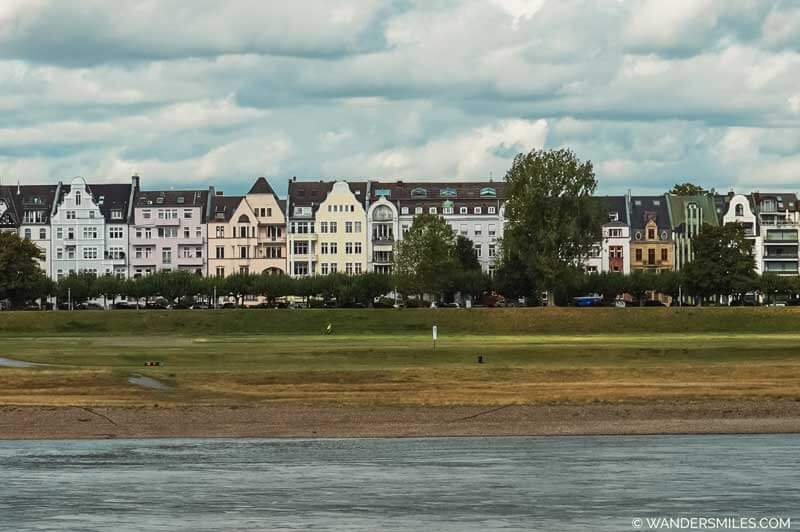 Views of old houses in Oberkassel Dusseldorf from across the River Rhine