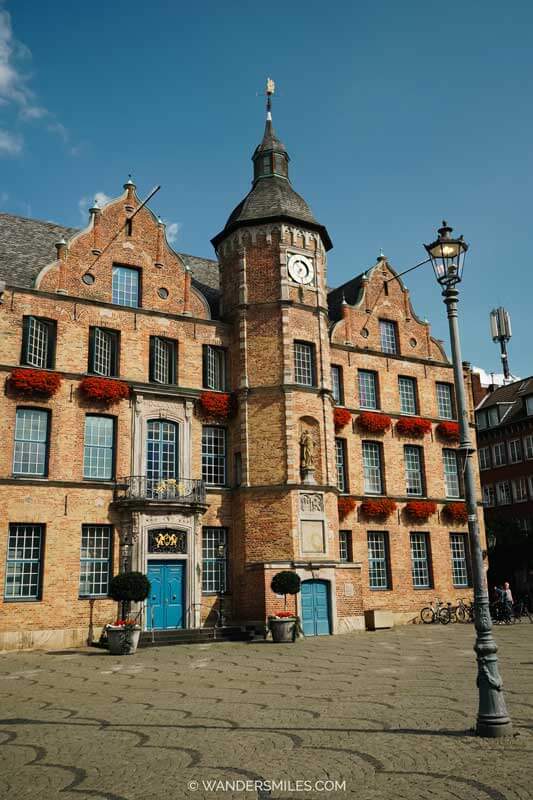 Town Hall (Ratthaus) in Dusseldorf - Red brick with a tower in the front