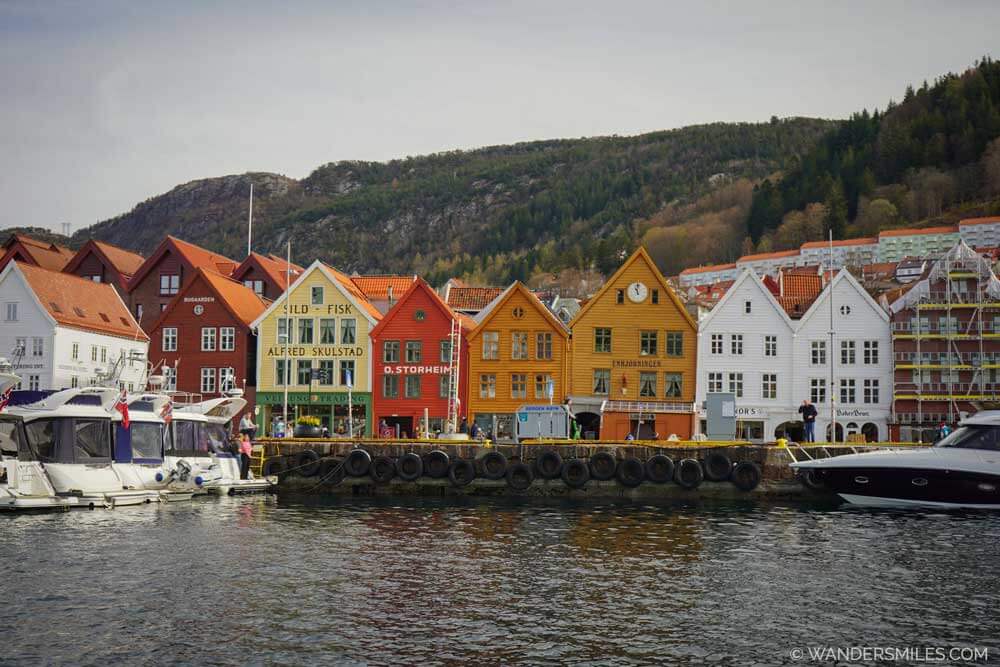 Colourful buildings of UNESCO area of Bryggen in Bergen Harbour, Norway. Cover photo for blog "20+ Brilliant Things To Do In Bergen In Spring"