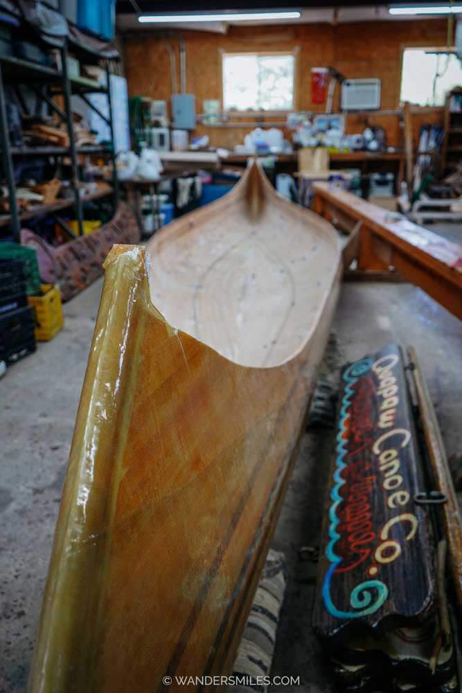 Long wooden canoes in the workshop at Quapaw Canoe Company, Clarksdale