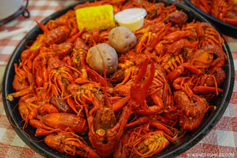 A big plate of crawfish boil with sweetcorn and potatoes, popular in Louisiana