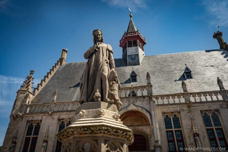 Statue of Jacob van Maerlant in front of the Town Hall in Damme’s Market Square (Markt), Flanders