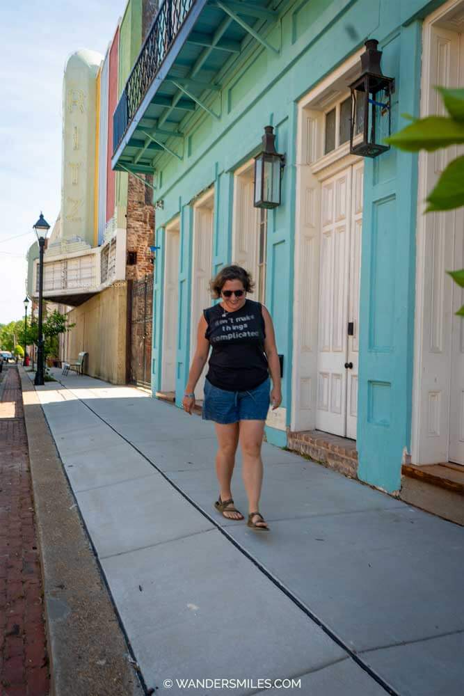 Woman walking down North Commerce Street in Natchez