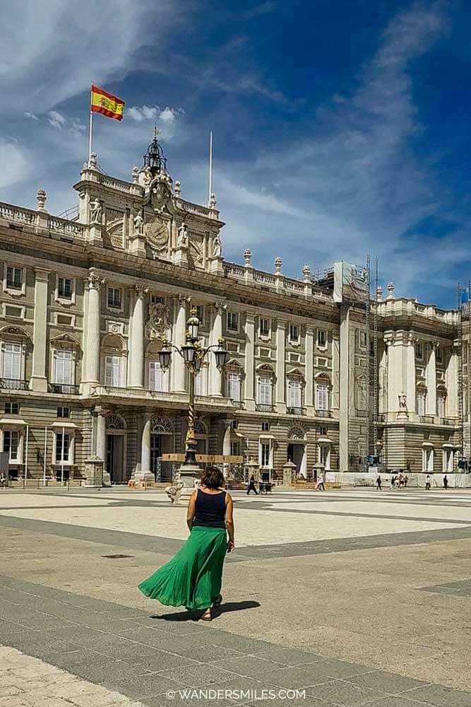 Woman (Vanessa) in green skirt in the central courtyard of Royal Palace of Madrid