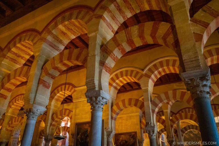 The iconic red-and-white striped arches in the Mosque-Cathedral Monumental Site of Córdoba (the Mezquita)