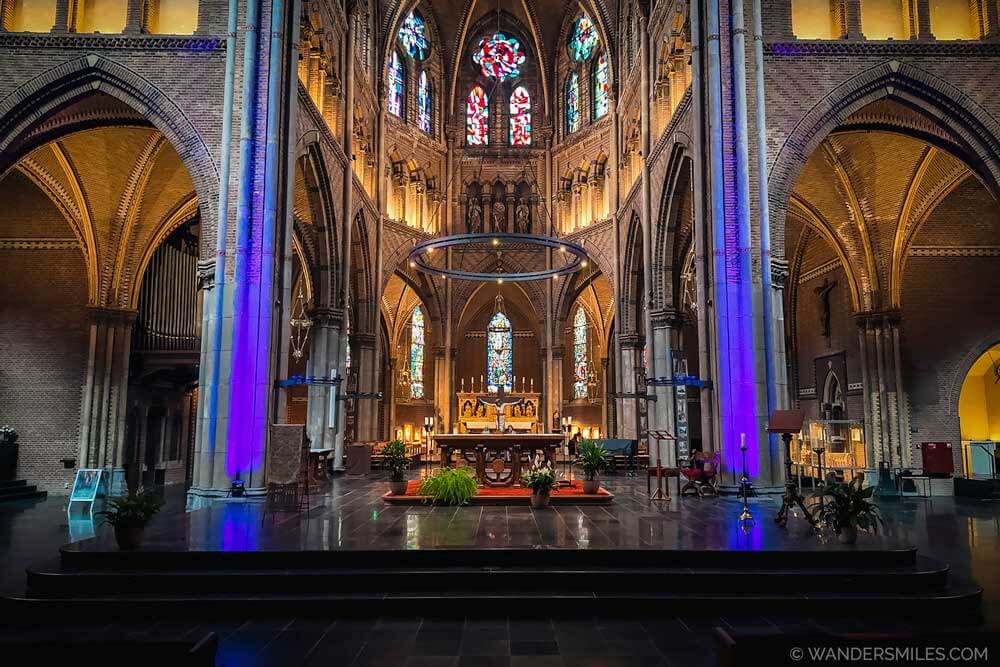 St Catharinakerk in Eindhoven - Photo shows the Front of the church, altar and purple lights.